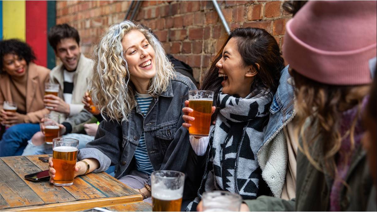 friends having beer together at a brewery